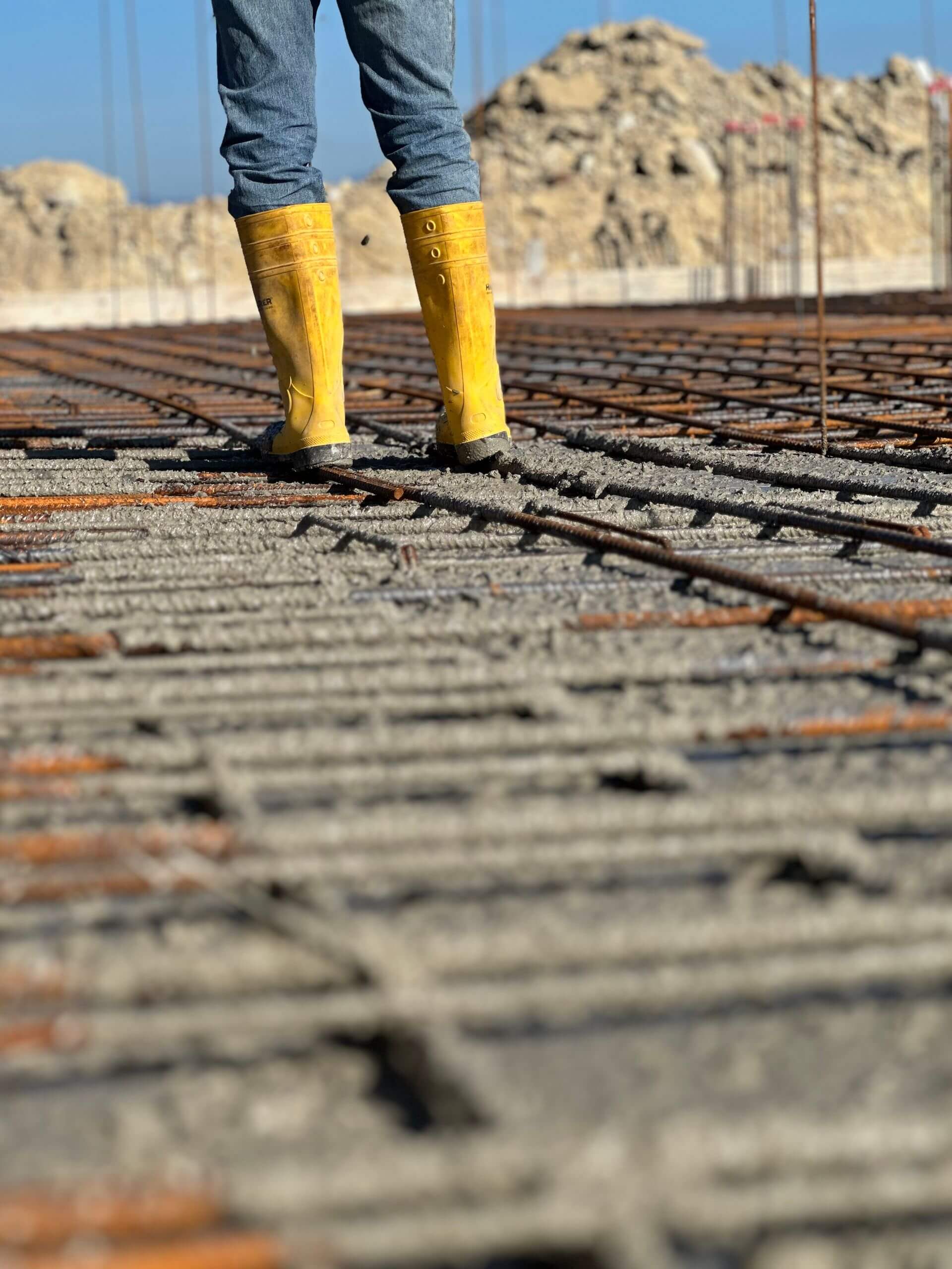 Concrete foundation works at industrial construction site
