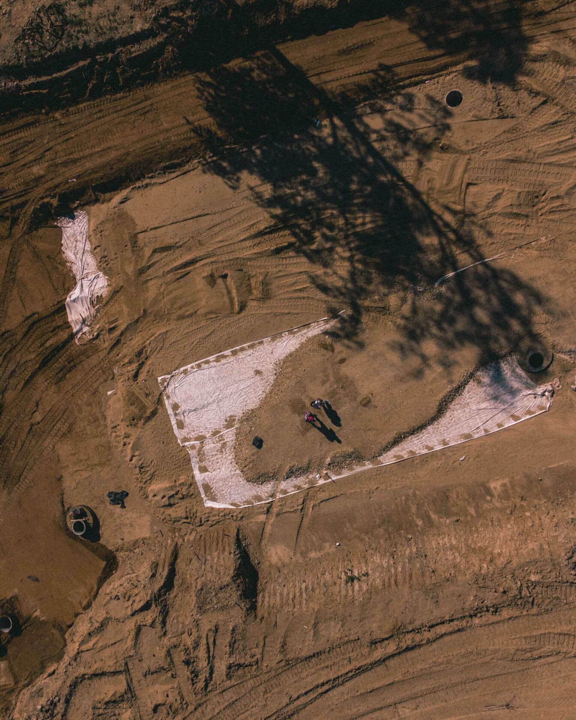 Sediment removal from tailings storage facility